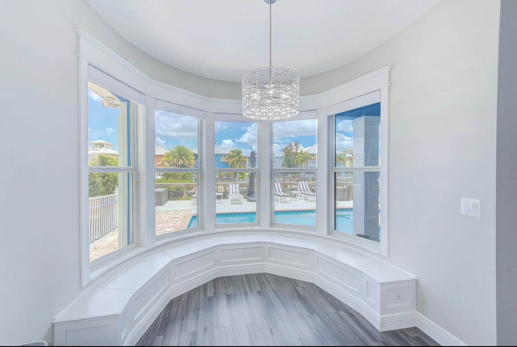 Curved built-in breakfast nook and bay window